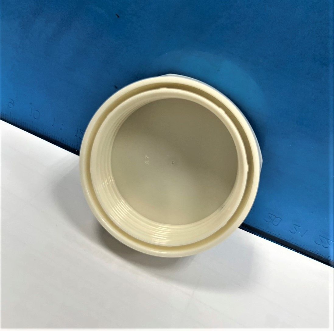 A white circle is sitting on a blue surface