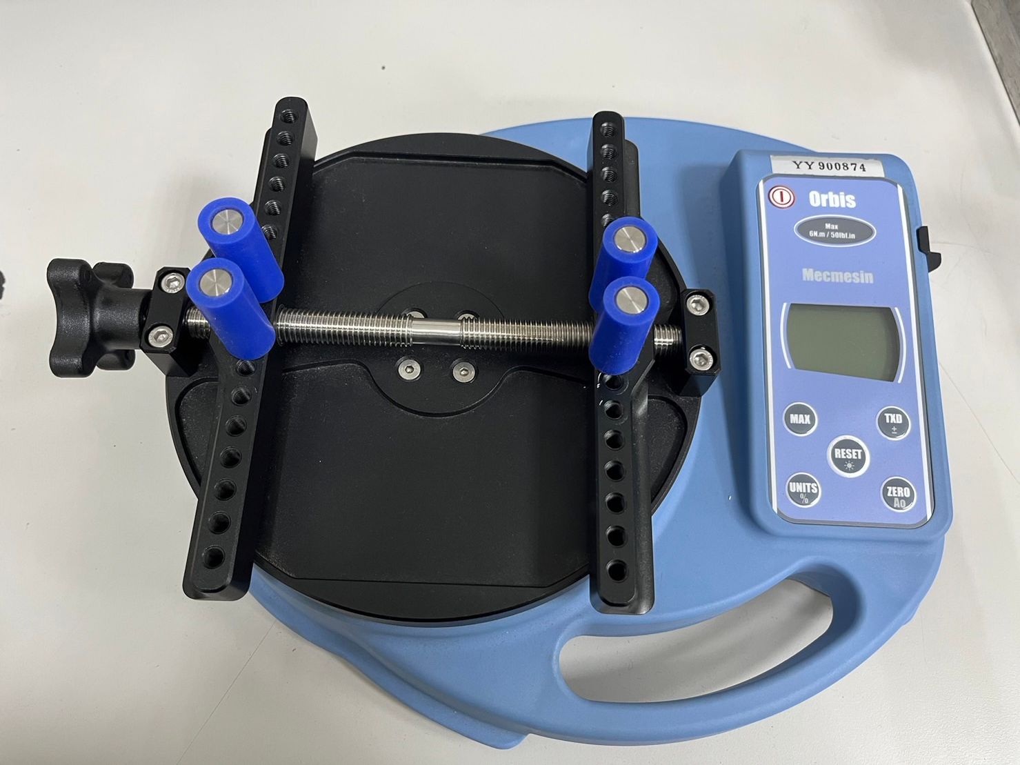 A device that looks like a bug is sitting on a table.