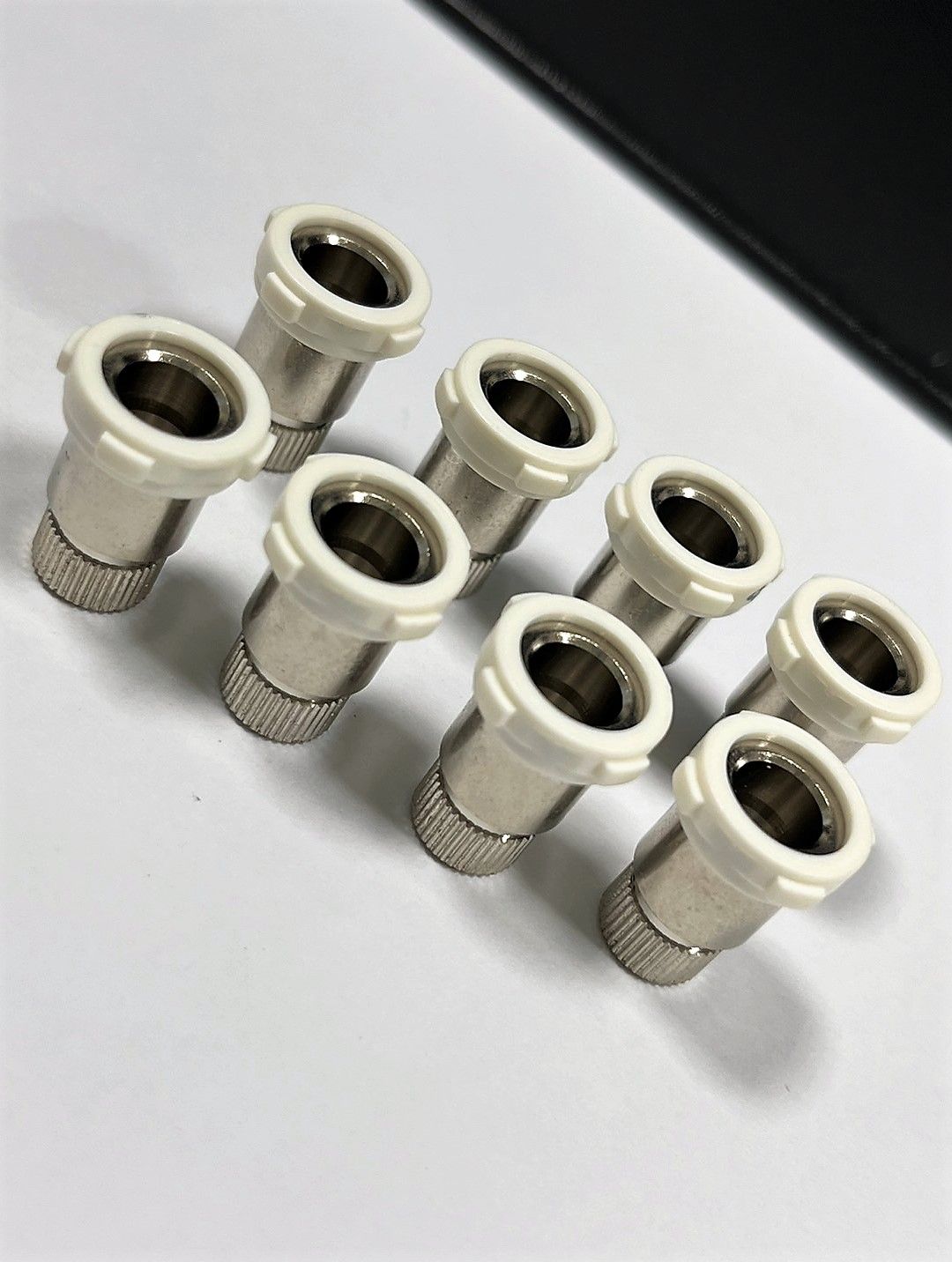 A bunch of nuts are sitting on top of each other on a table.