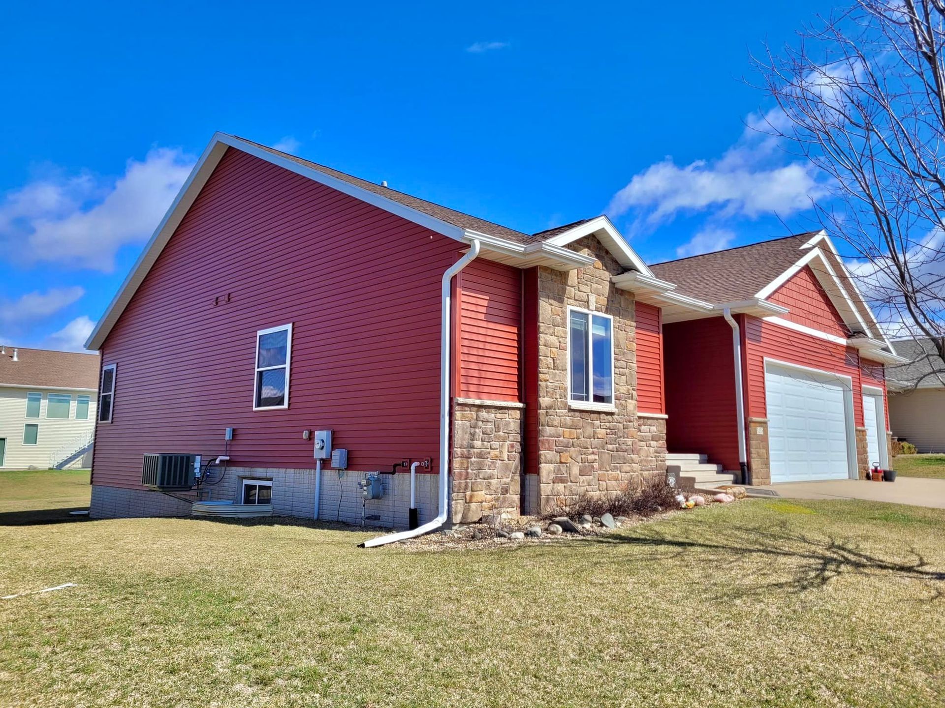 Large House With Red Sidings — Tipton, IA — Meeks Construction Inc.