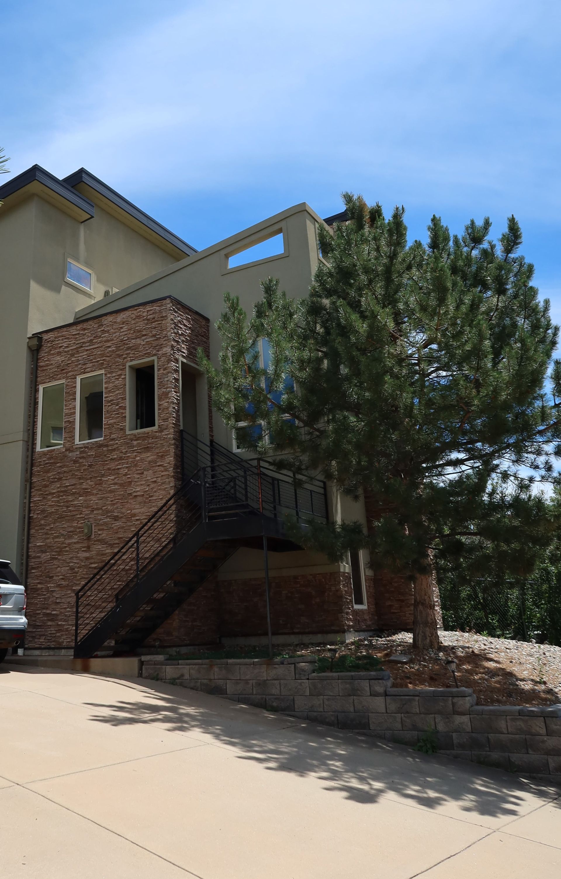 A house with stairs leading up to the second floor