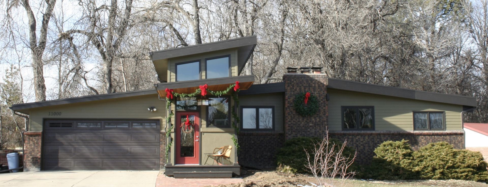 A house with a wreath on the front of it
