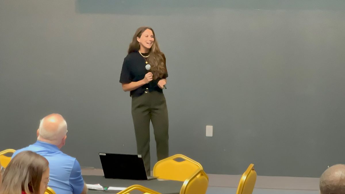 Man and woman holding a wine glass — Thryv Foundation