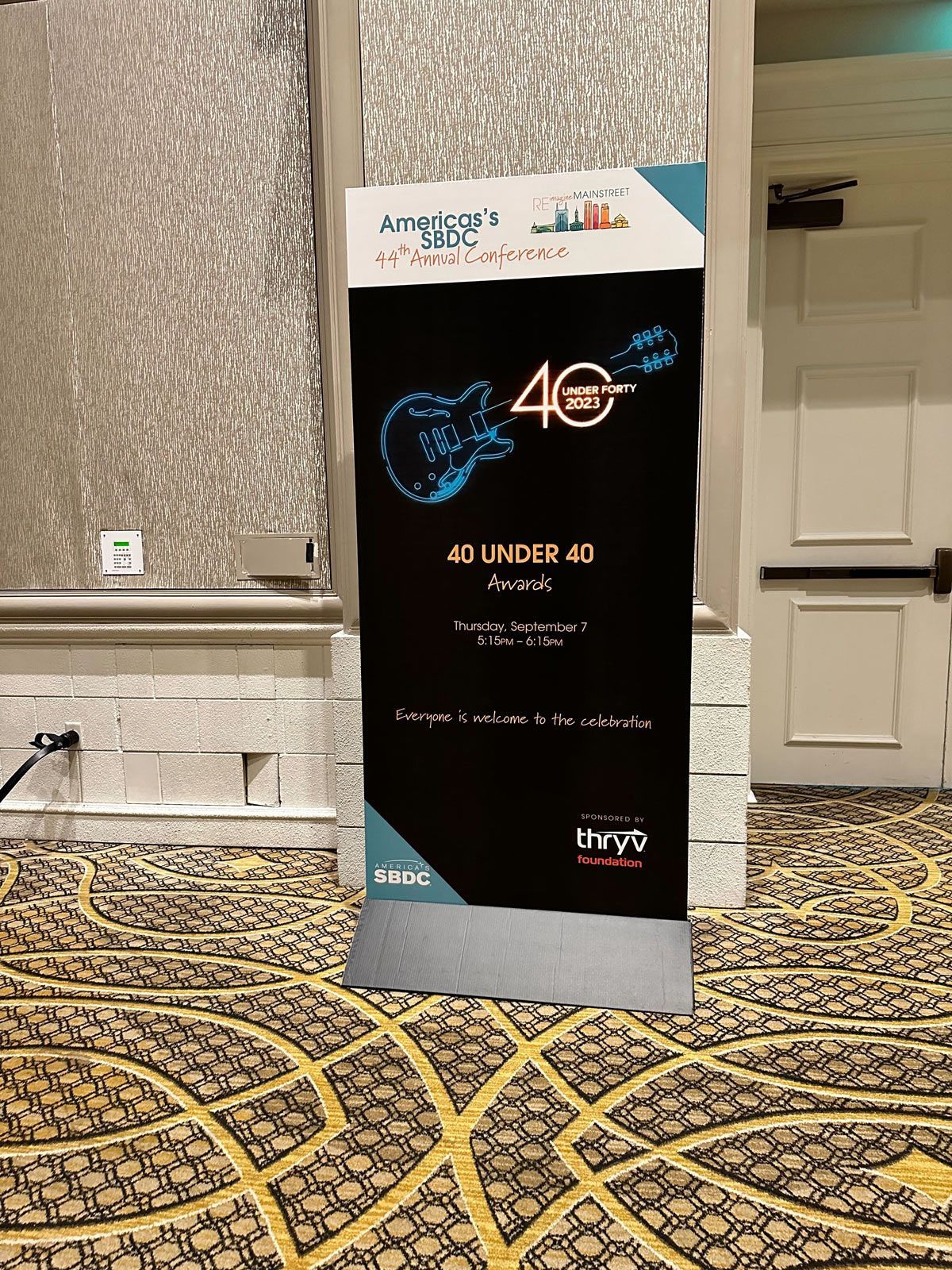 A sign in a room — Thryv Foundation