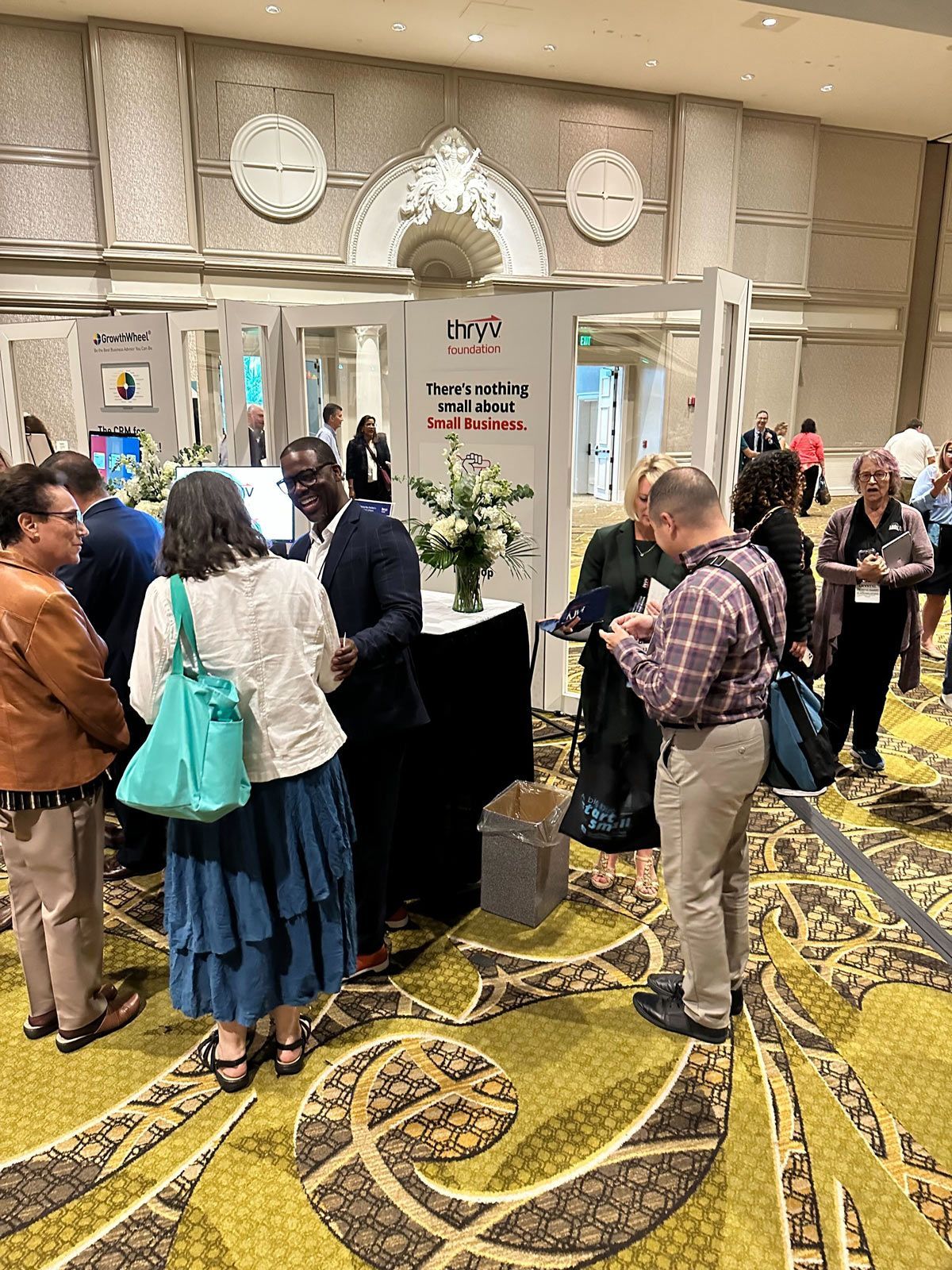 A group of people in a room — Thryv Foundation