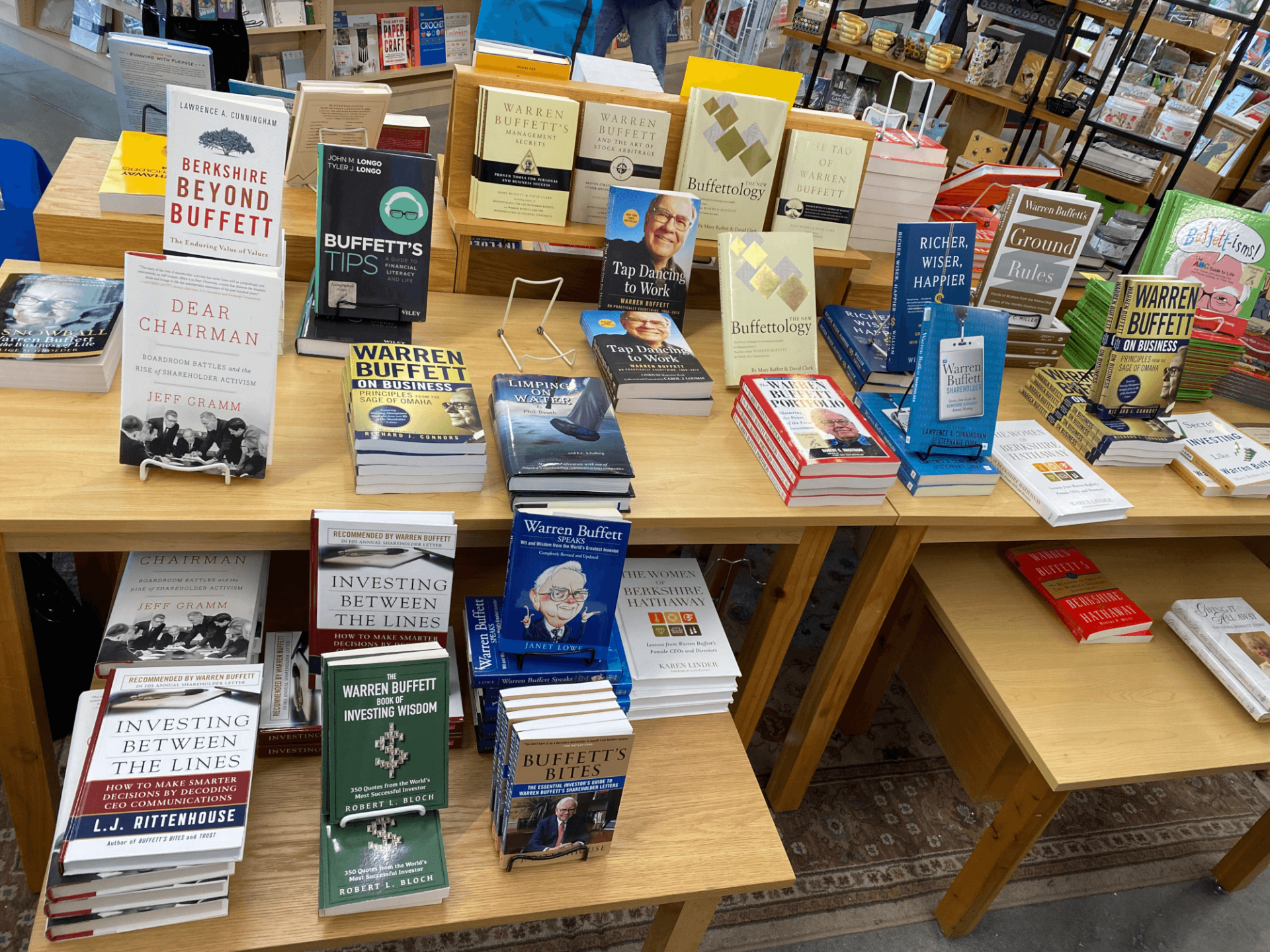 Table with many books about value investing, Warren Buffett and Charlie Munger at The Bookworm bookstore in Omaha.