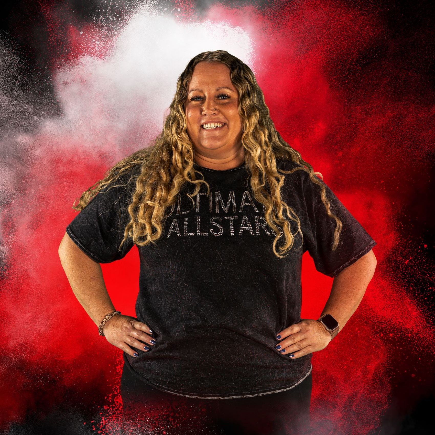 A woman wearing a black shirt that says ultimate allstar