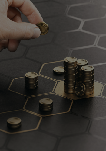 Hand placing coins on a board with coin stacks. Dark background with gold accents.