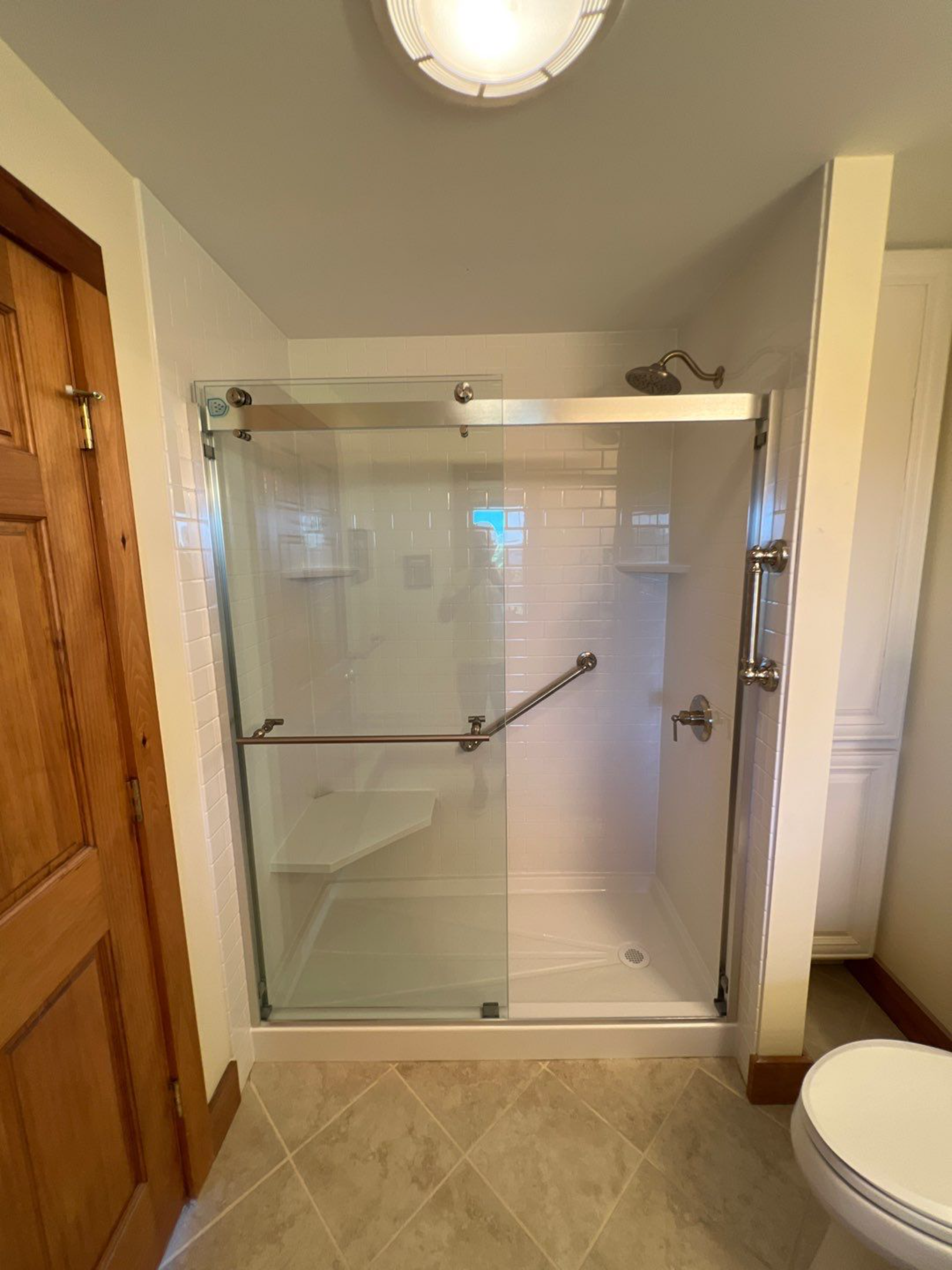 modern walk in master shower white tile