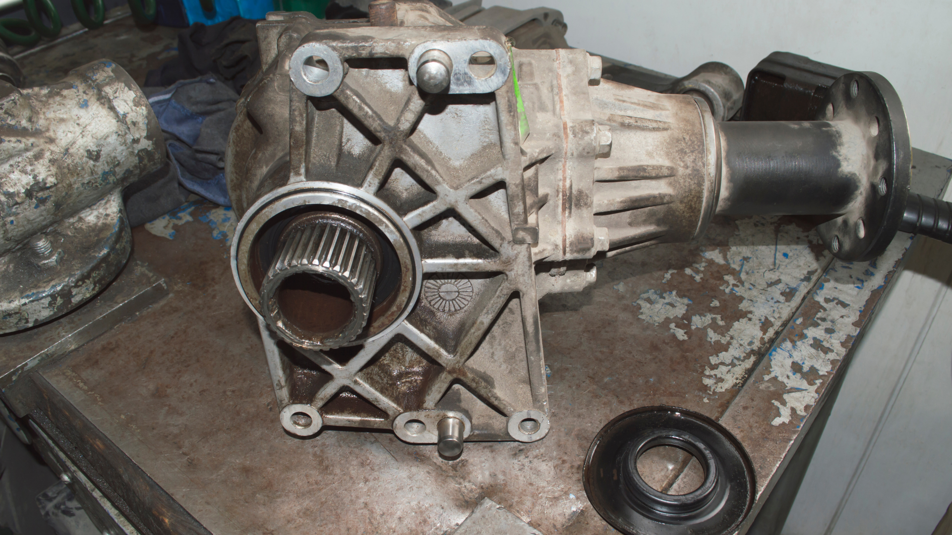 A gearbox is sitting on top of a metal table.