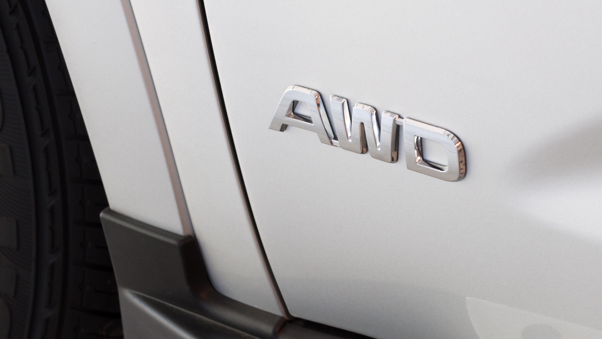 The word awd is on the side of a car