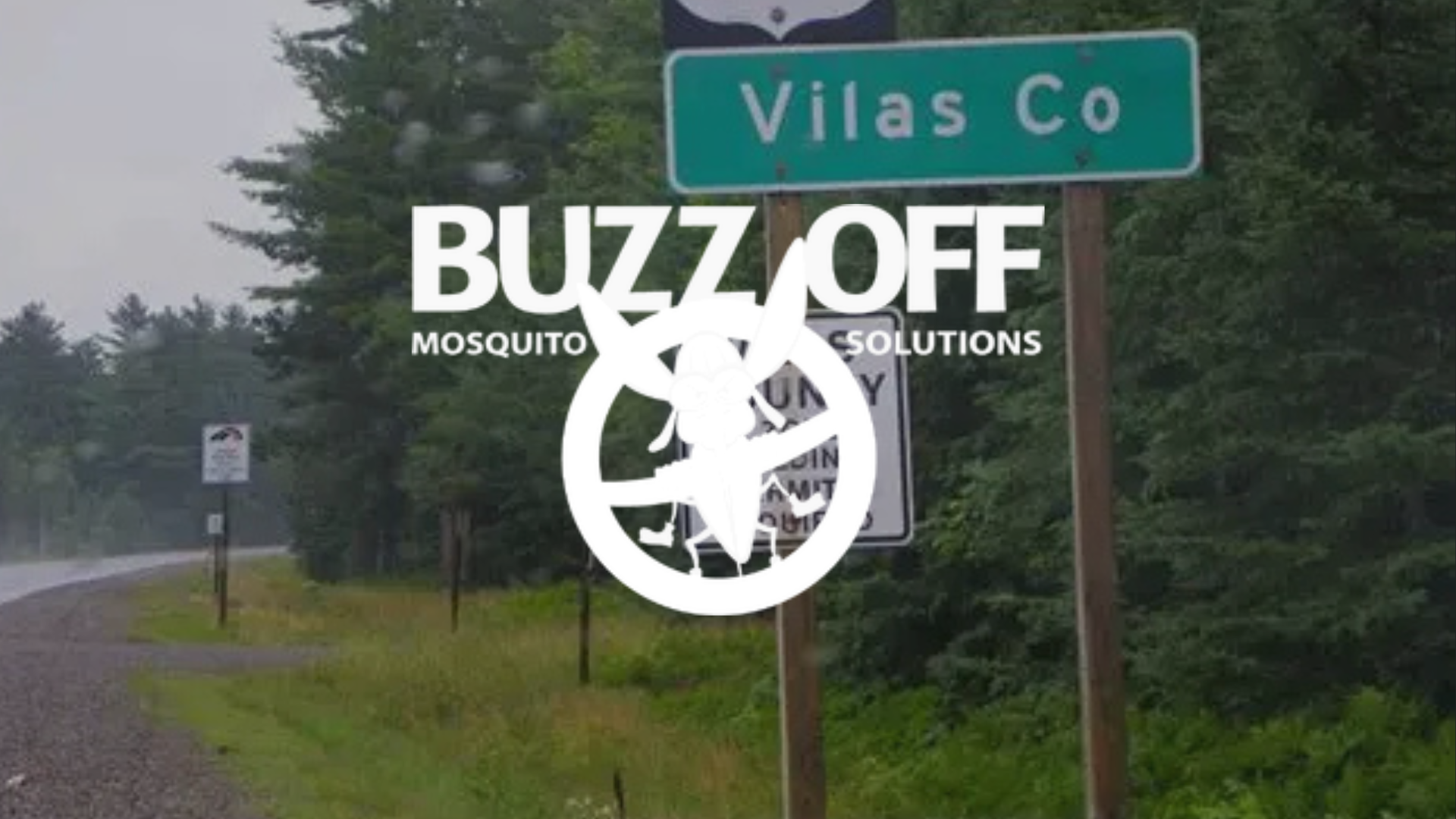 A sign that says vilas co on it with the buzz off mosquito solutions logo on top