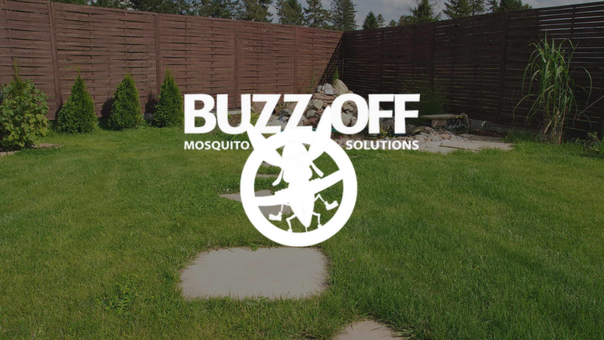 The logo for buzz off mosquito solutions is on a grassy field.