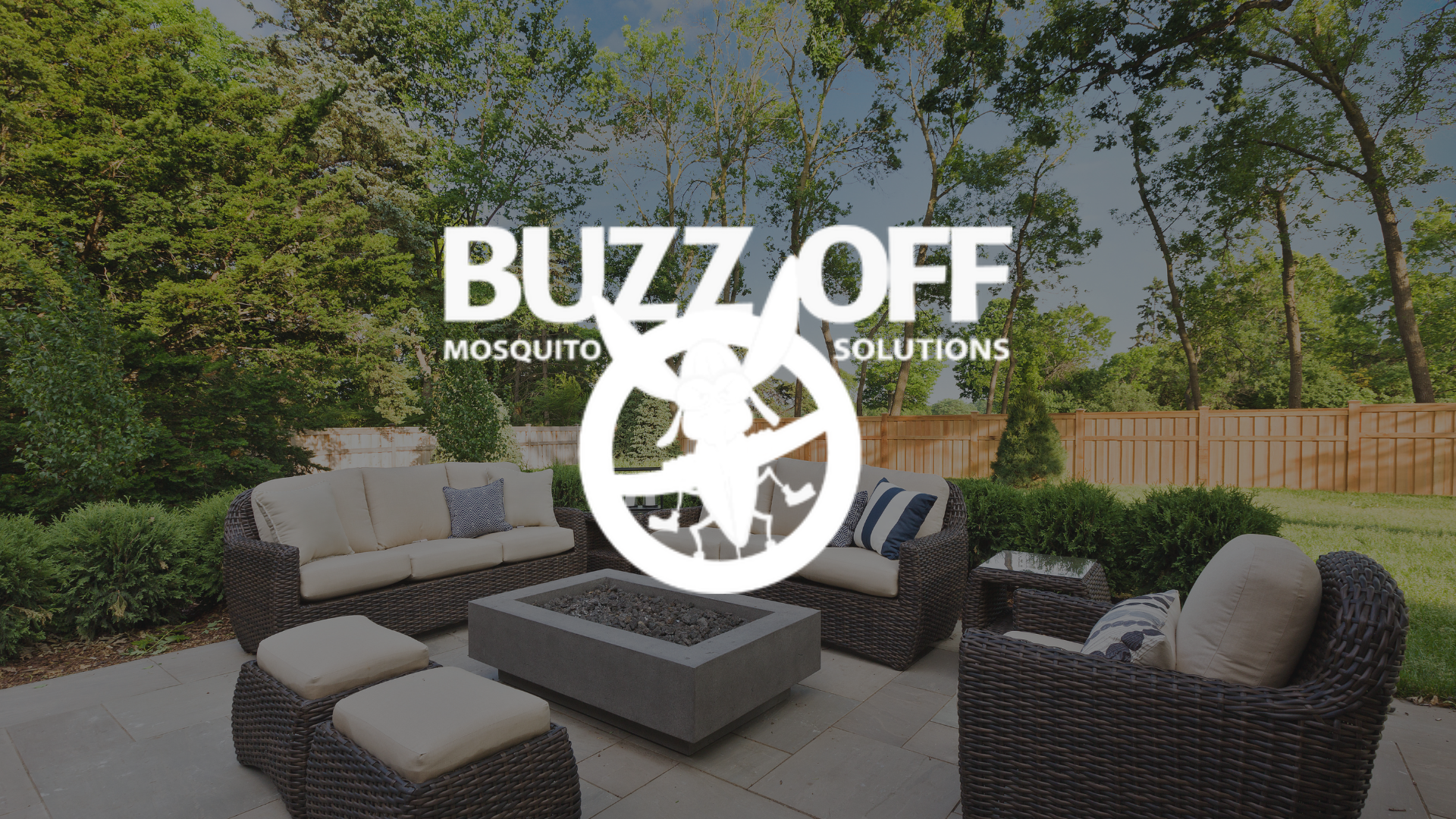 The logo for buzz off mosquito solutions is on a wooden deck.