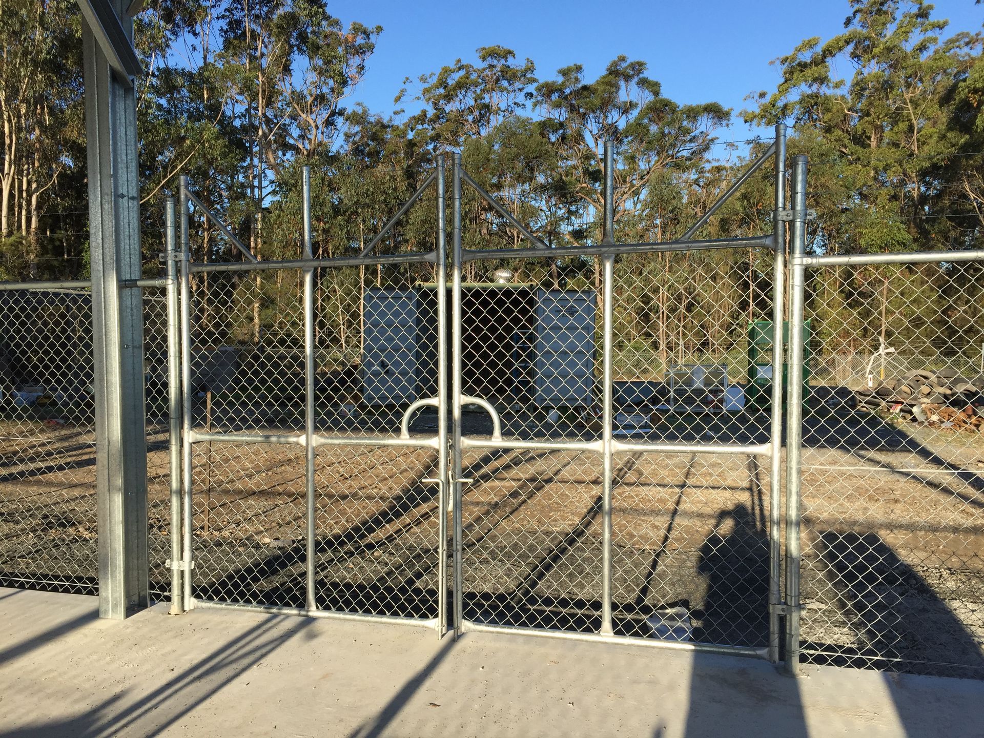 Chain-link Fence With Double-gate Entrance, Metal Posts, and a Concrete Path — Fencer Steve In Temagog, NSW