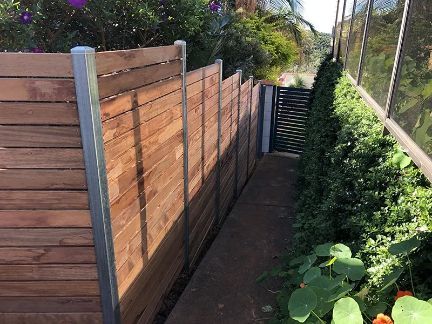 Wooden Fence With Metal Posts, a Gate, and a Narrow Path — Fencer Steve In Temagog, NSW