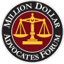 The logo for the million dollar advocates forum is a scale of justice in a circle.