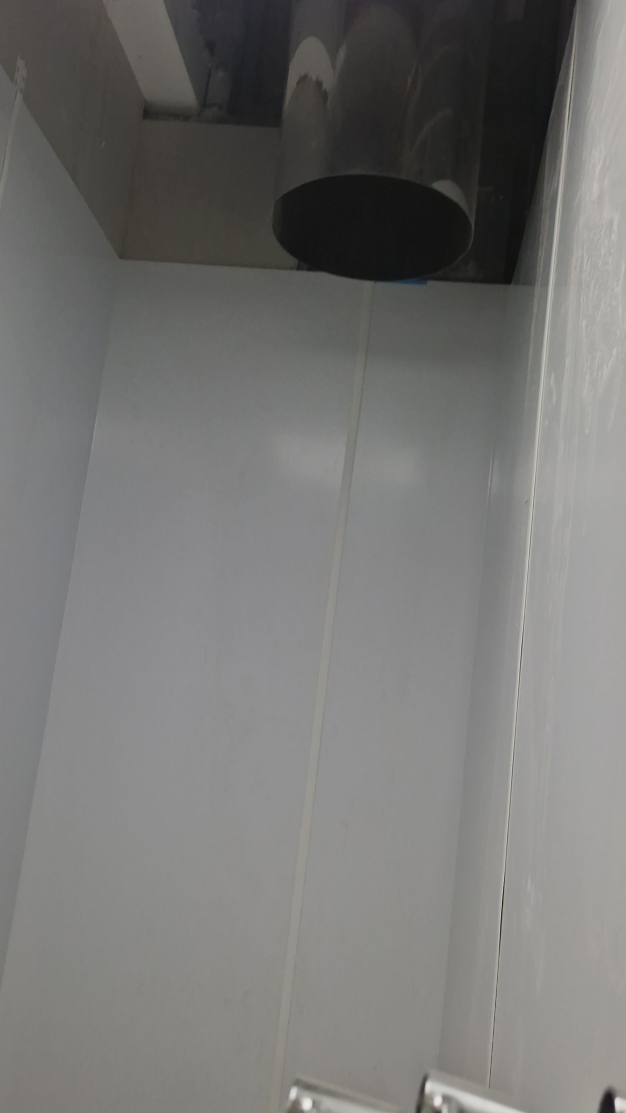 Fully installed laundry chute with smart controls