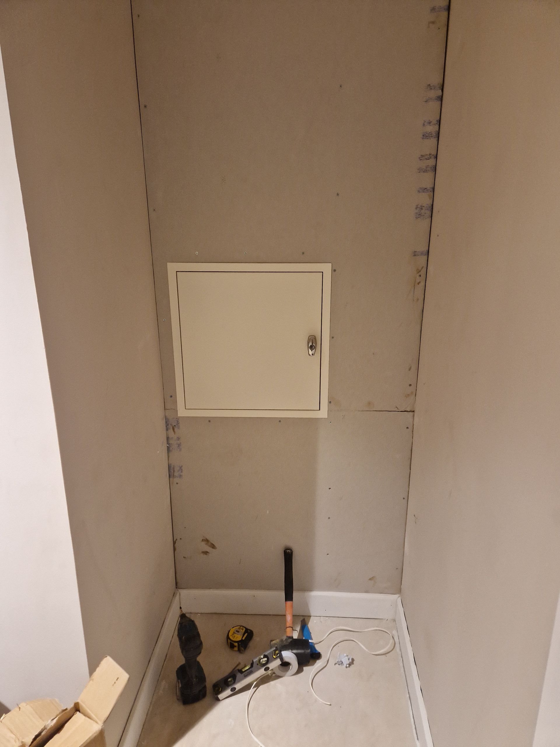 Smart Integration in Laundry Chute System Smart keypad installation on middle door