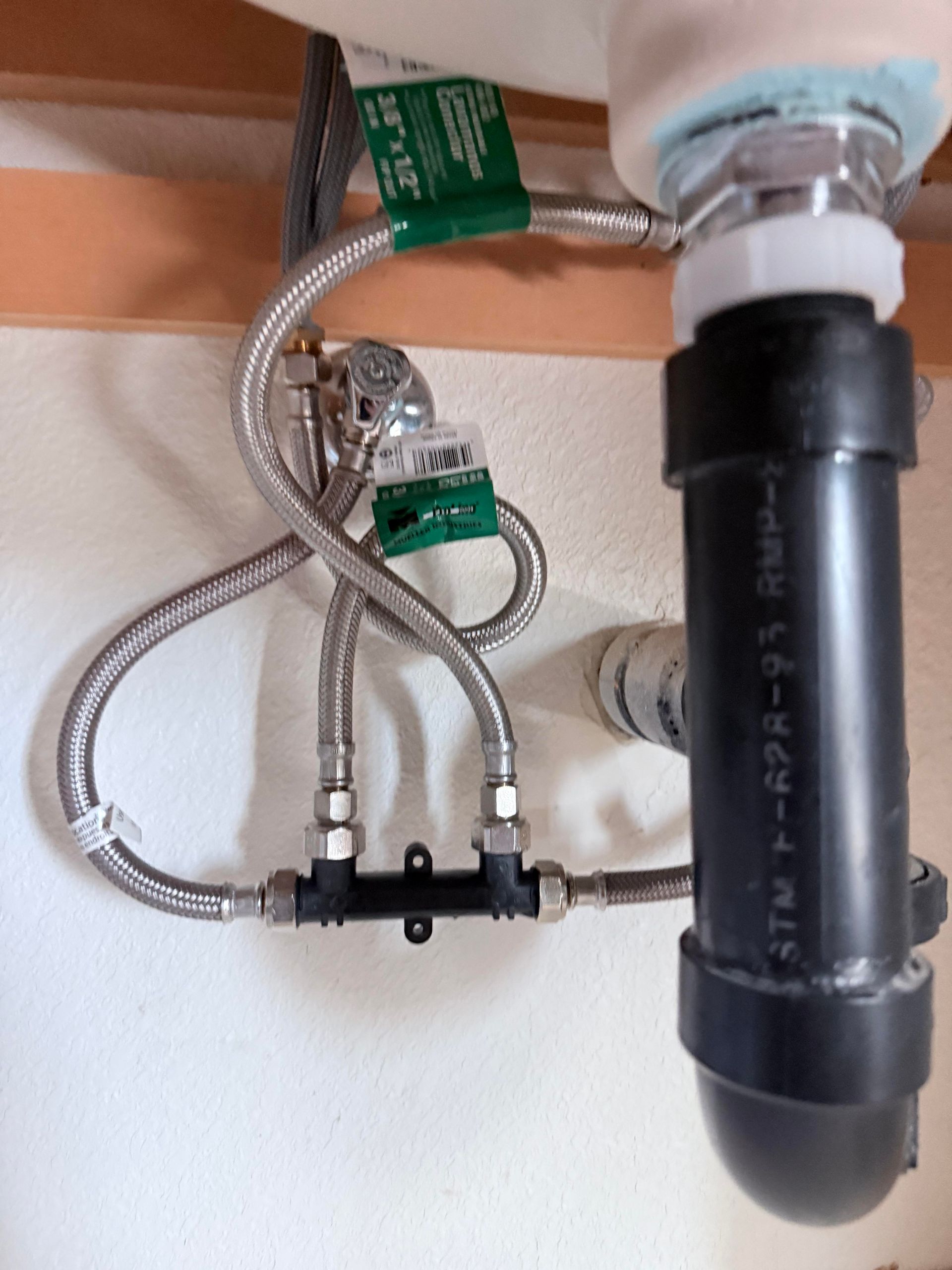 A black pipe with the letters atm on it