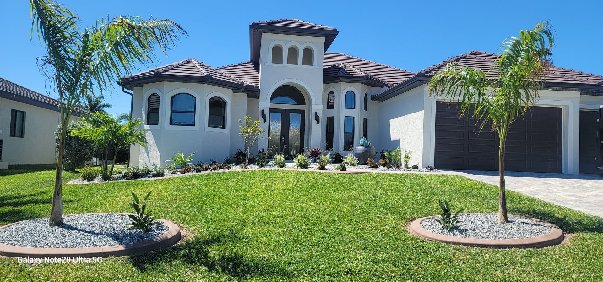 Front view of a house — Cape Coral, FL — MK’s Lawn, Pool, & Maintenance Service