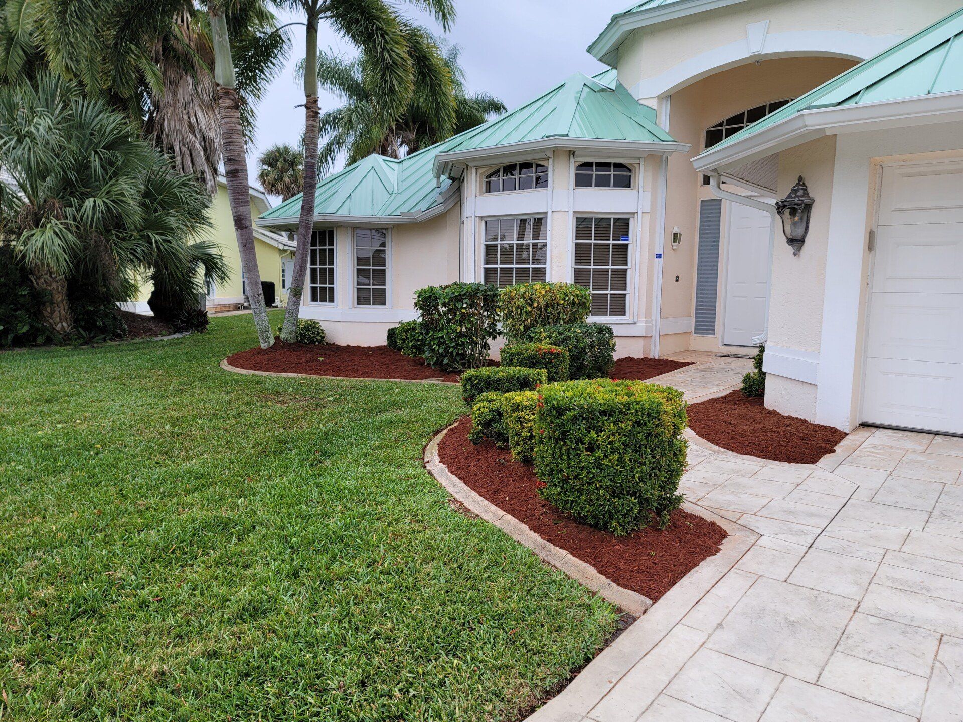 View of a house with landscape — Cape Coral, FL — MK’s Lawn, Pool, & Maintenance Service
