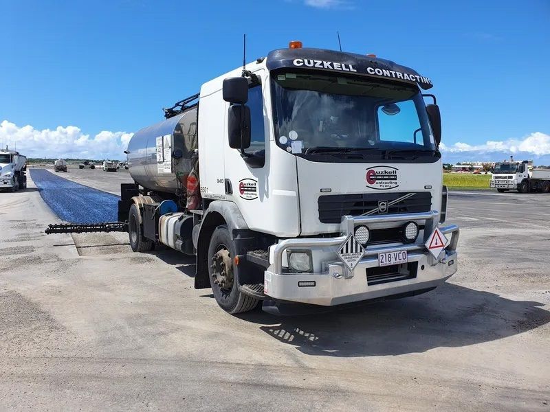 A White Truck is Sealing a Road — Cuzkell Pty. Ltd in Cooroy, QLD