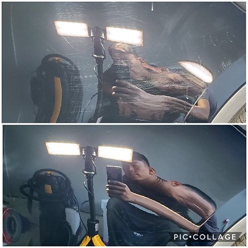 A man is taking a picture of himself in a mirror.