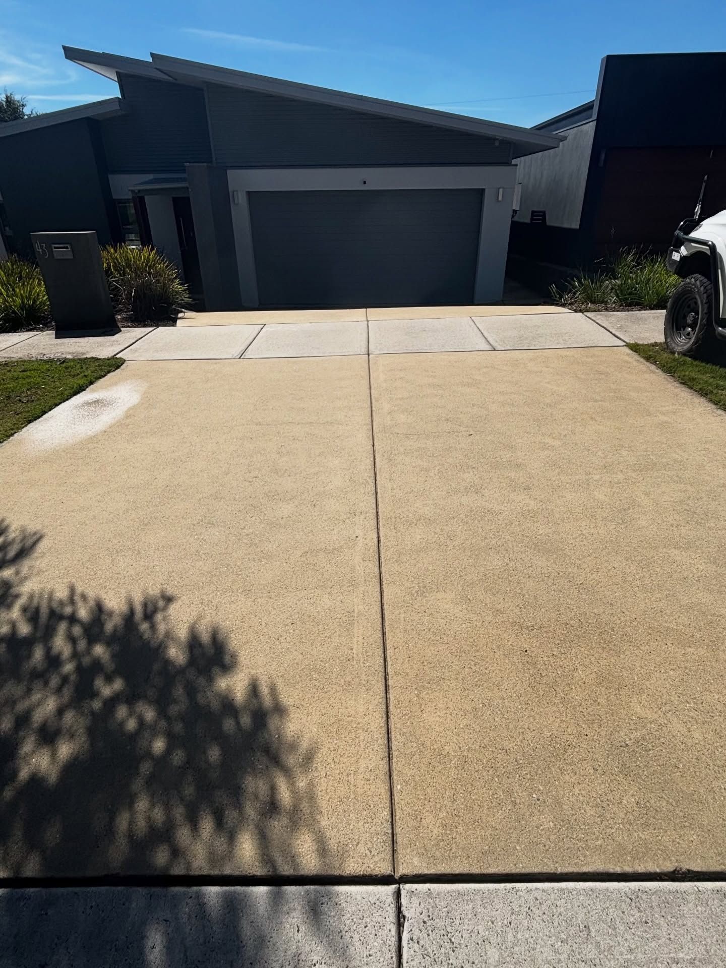Paved Driveway Leads to a Modern — Pressure Perfect Cleaning Solutions in Symonston, ACT