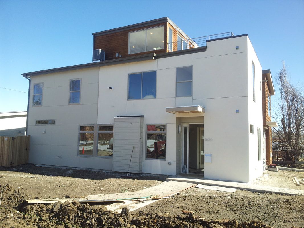 A large white building with a lot of windows