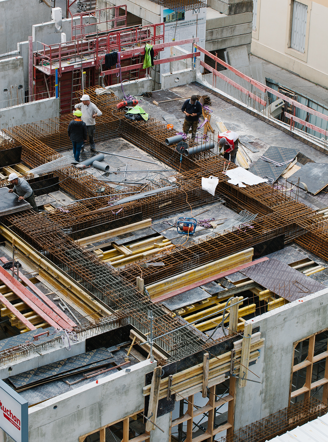 An aerial view of a construction site with people working on it