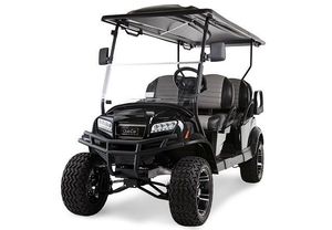 Black off-road golf cart with roof and rugged tires on a white background