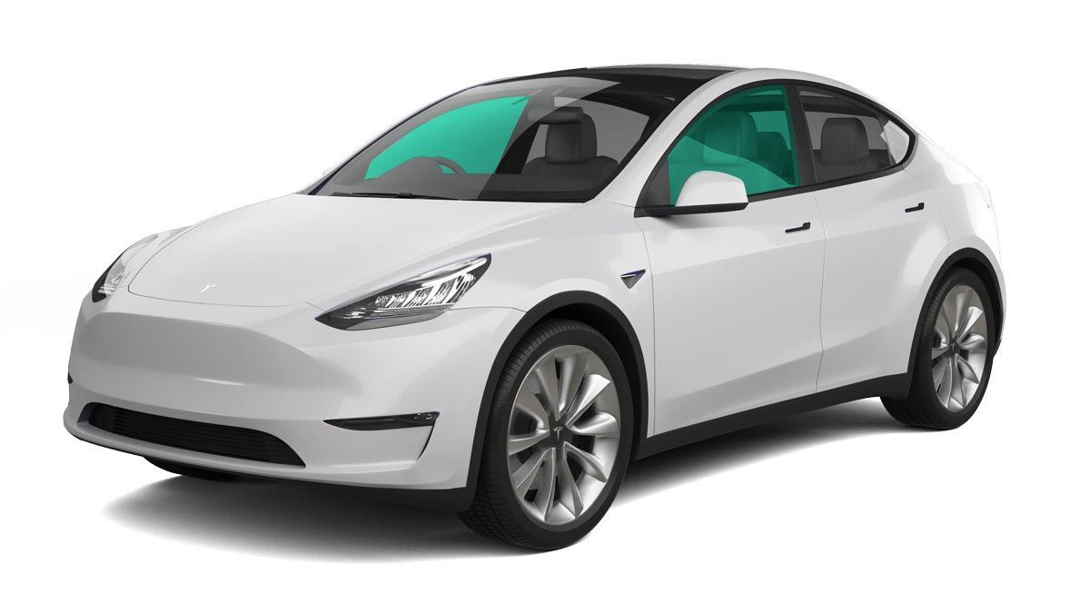 White Tesla Model Y with teal tinted windows.