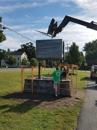 Installing Sign — sign company in Albany, NY