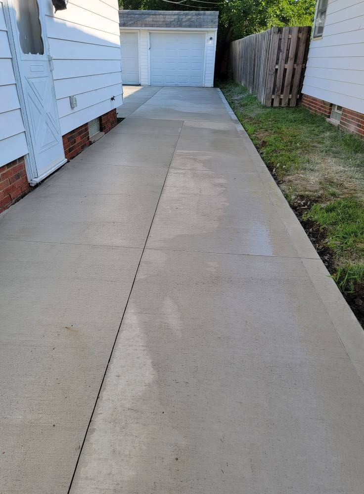 There is a fire pit in the backyard of a house.