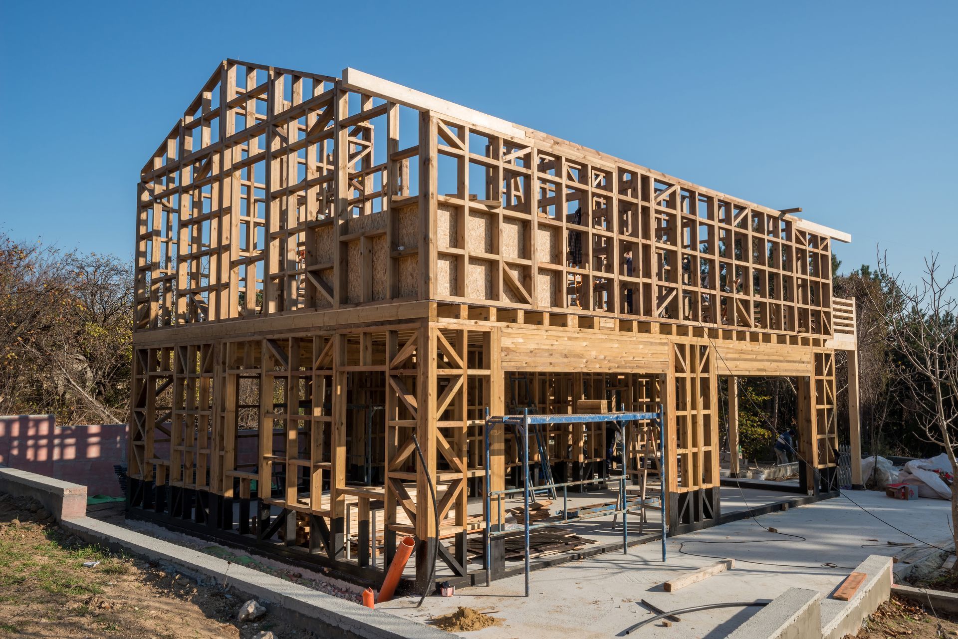 A house is being built with a wooden frame.