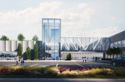 Un groupe de personnes marche devant un grand bâtiment.