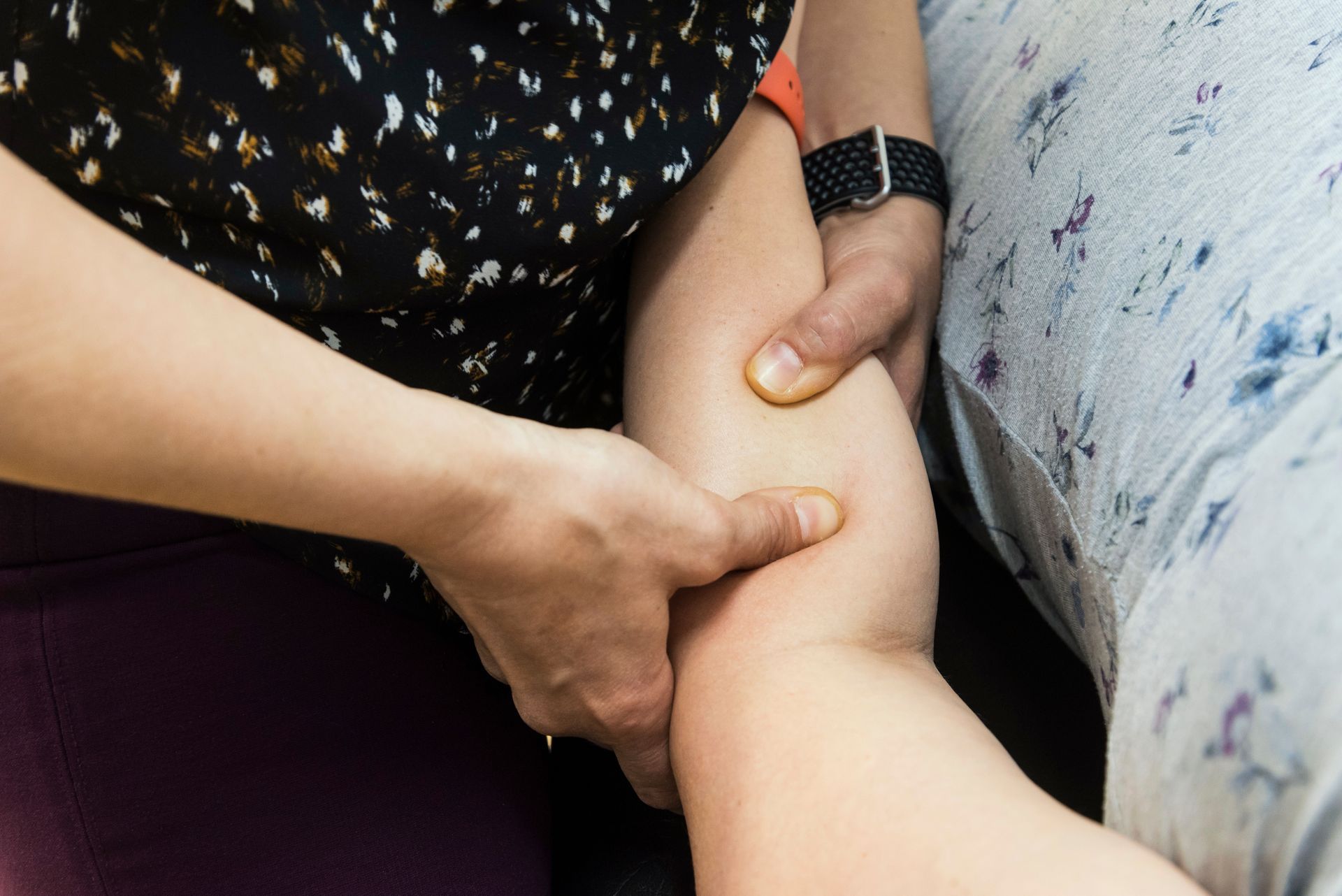 Modern Sports Physio & Wellness physiotherapist massaging patient's arm