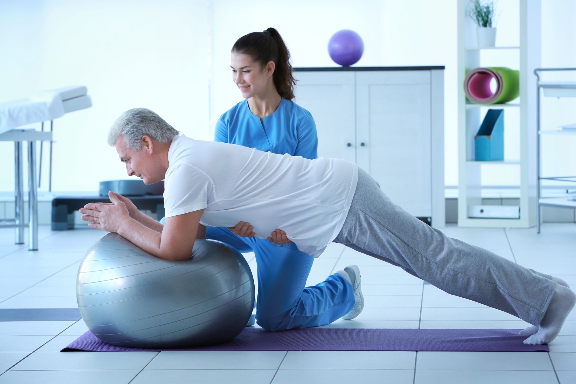 physiotherapist helping patient during Diabetes physical therapy exercise