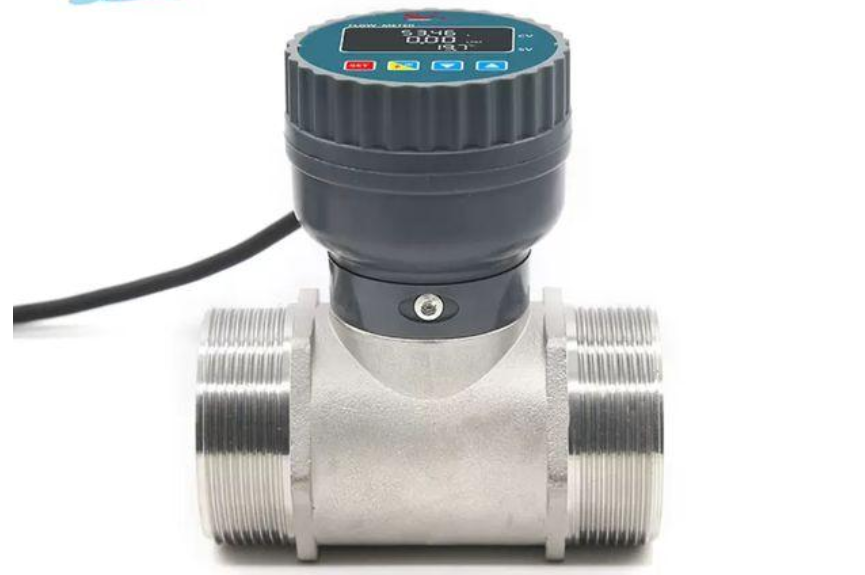 Flow meter with digital display, steel body and screw fittings.