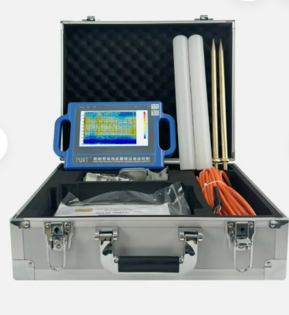 Water Finding. Open metal case containing a ground penetrating radar device and accessories.