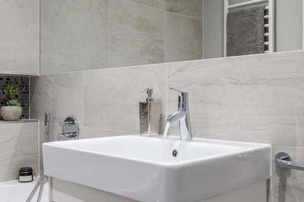 Picture of a new white sink installed by Plumbers Sheffield