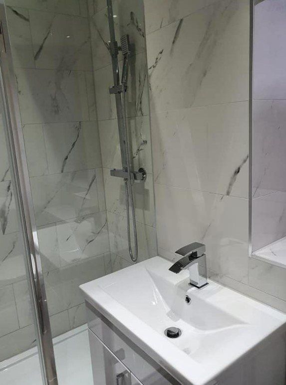 Picture of a new shower and sink installed by Plumbers Sheffield