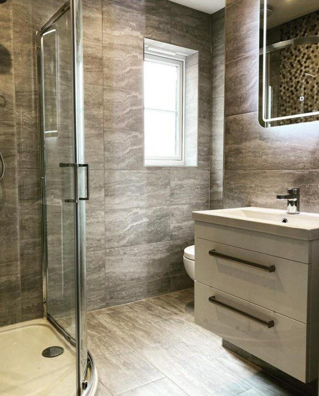 Picture of a walk in shower and en suite fitted by plumbers Sheffield
