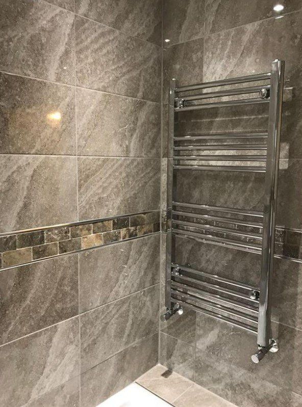 Picture of a chrome towel radiator fitted by plumbers Sheffield