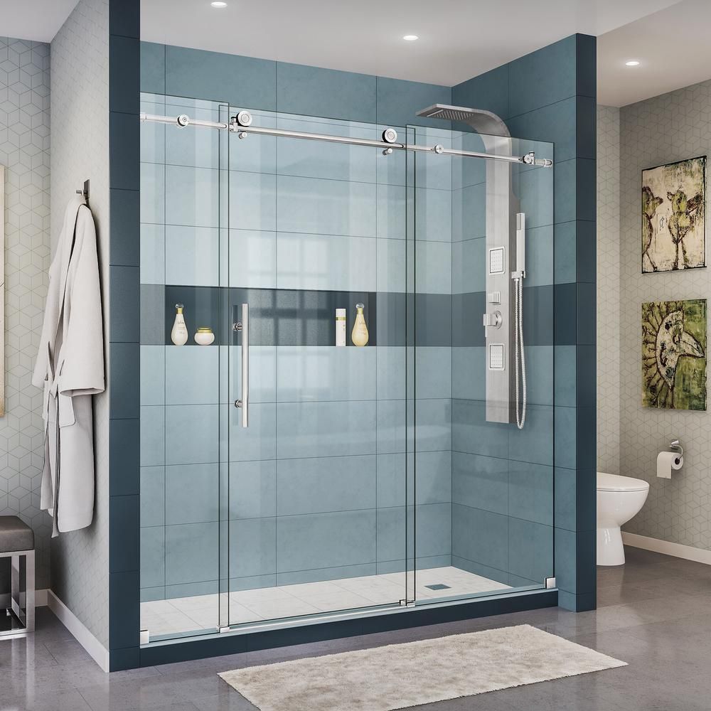 A bathroom with a sliding glass shower door and a toilet