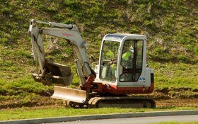 Landscaping services - Fakenham, Cromer, Wells-next-the-Sea, Norfolk - Woody's General Maintenance - Mini Digger