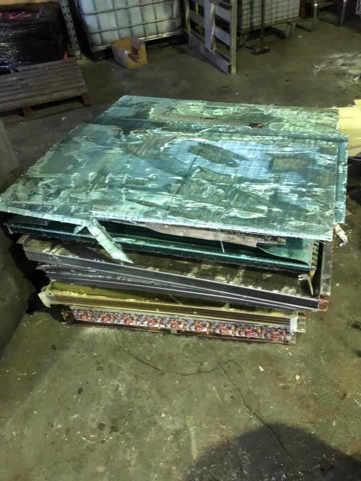 Stack Of Copper Panels, Weathered And Green — H&H Metal Recycling in Maleny, QLD