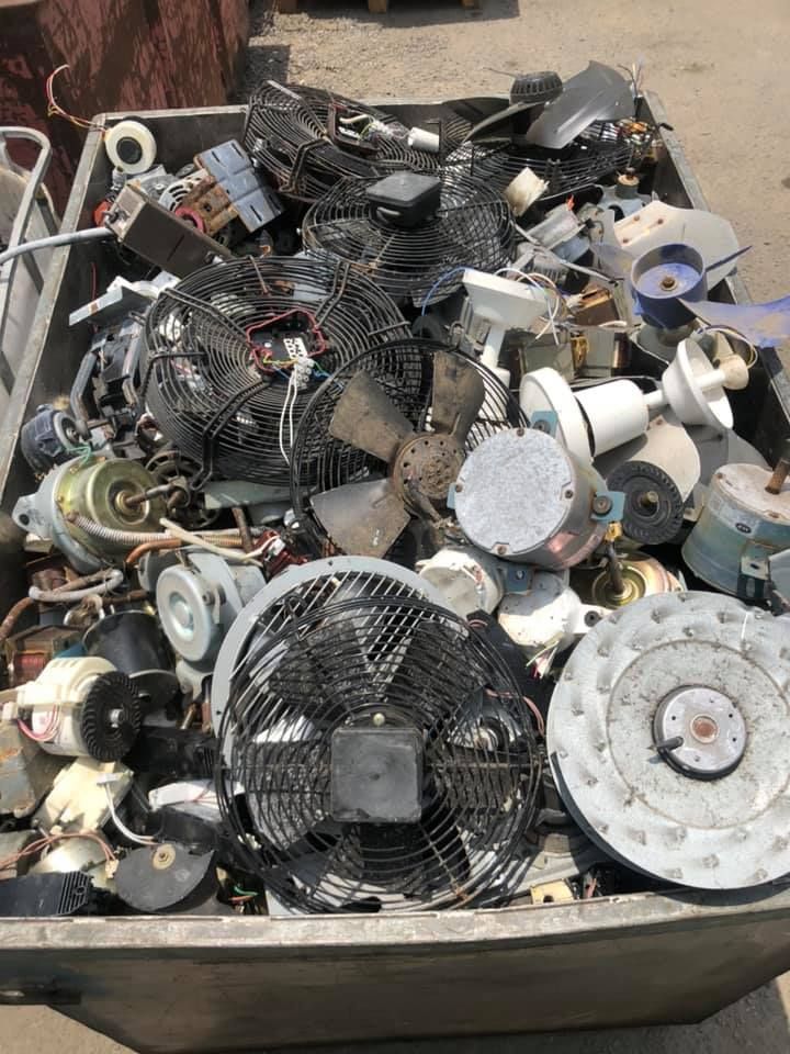 Pile Of Discarded Electric Fans And Motors In A Metal Container — H&H Metal Recycling in Pelican Waters, QLD