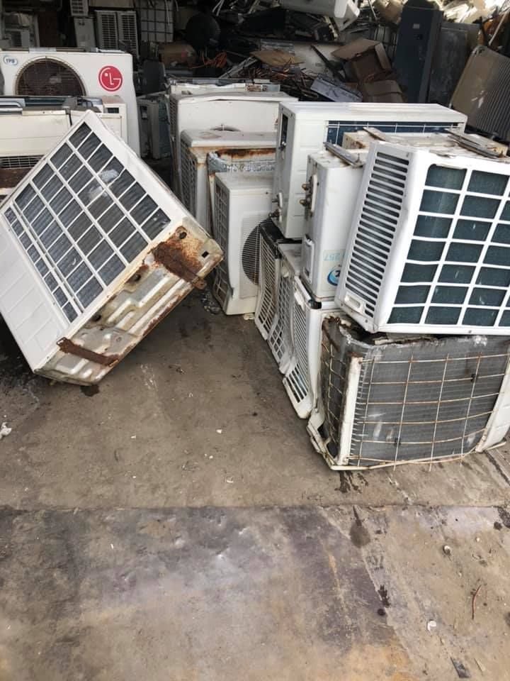 Pile Of Discarded Air Conditioning Units In A Cluttered — H&H Metal Recycling in Pelican Waters, QLD